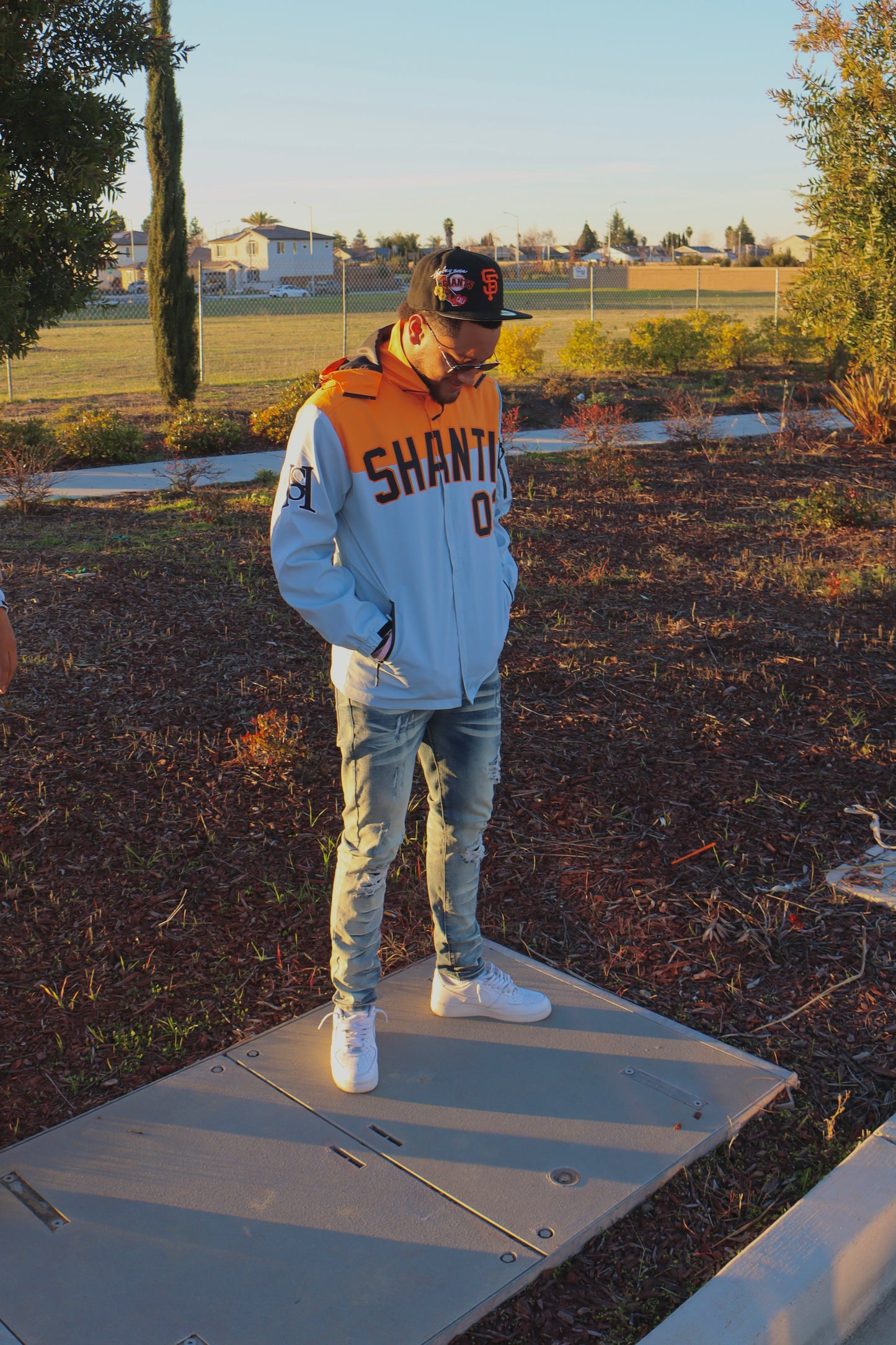 SHANTI GREY/ORANGE WINDBREAKER